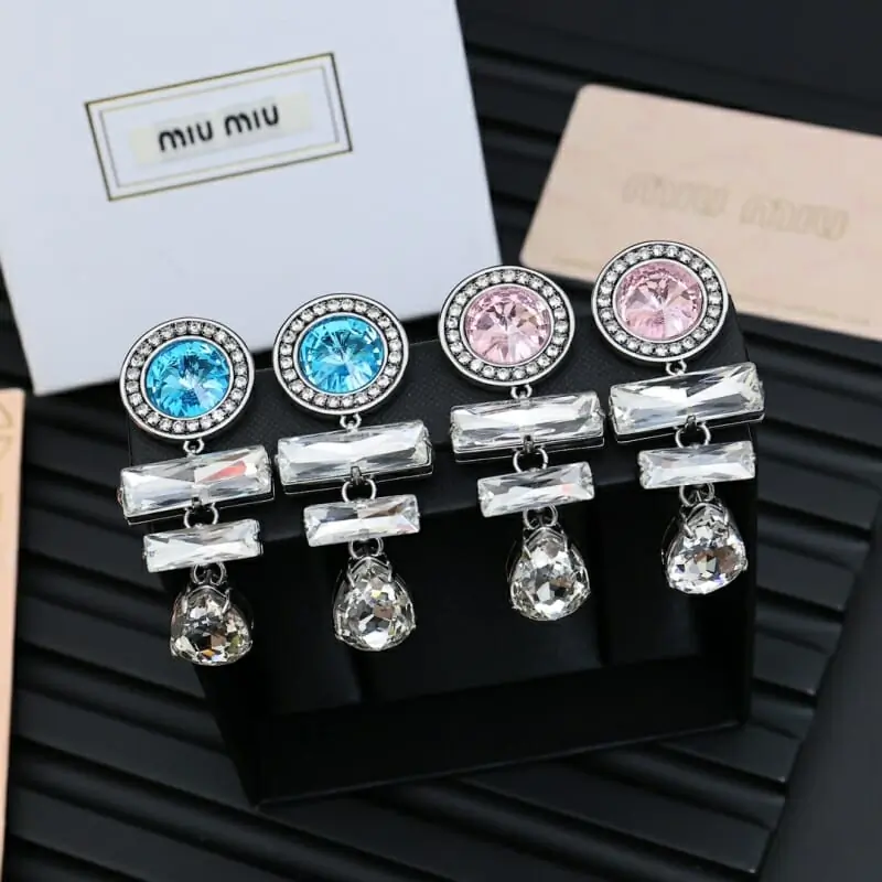 miu miu boucles doreilles pour femme s_123a20a1